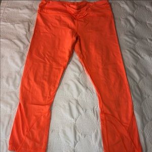 Orange lululemon run inspire crops